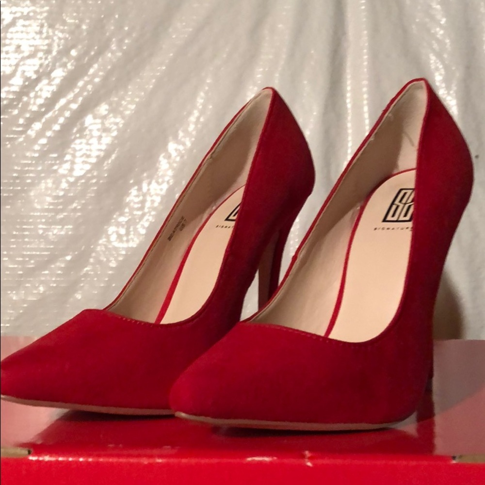 Red velvet pumps